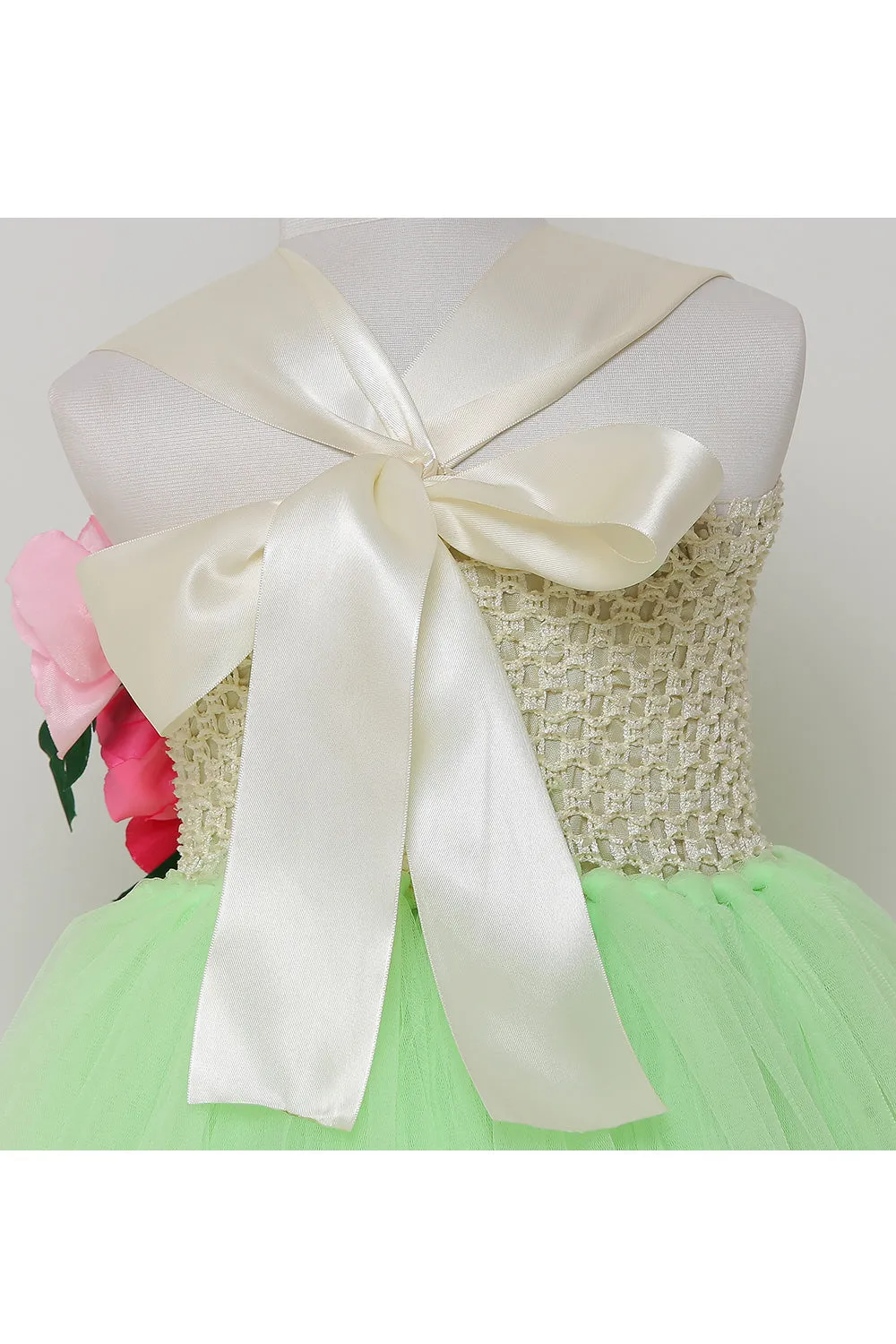 Neon green tutu gown with flowers on one side