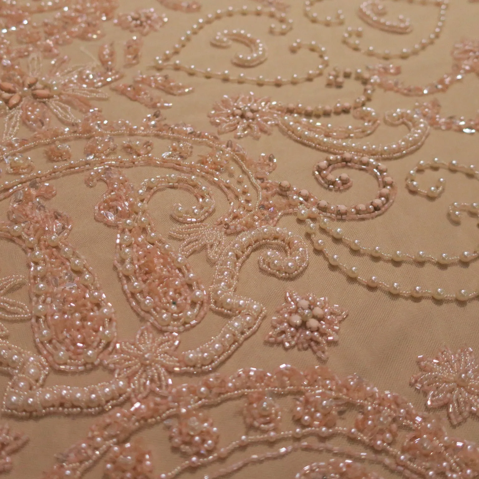 Peach Abstract with Feathers Embroidered Tulle Fabric